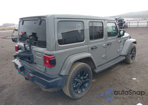 2022 Jeep Wrangler 4Xe Unlimited Sahara 4X4 z USA, uszkodzony, nr VIN 1C4JJXP68NW214467